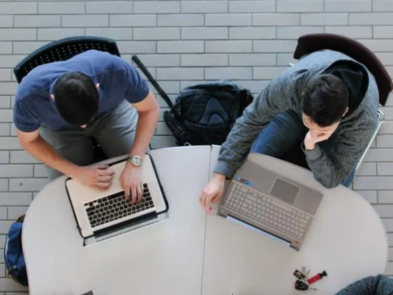 students at their laptops